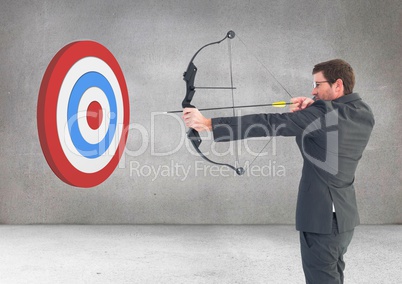 Businessman aiming at target with bow and arrow