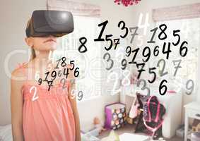 Girl wearing virtual reality headset at home