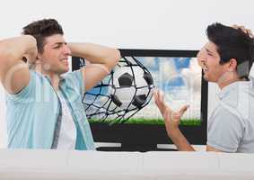 Friends disappointed while watching football match on television