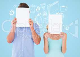 Couple holding blank page in front of their face against blue background