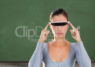Digital composite image of woman using virtual reality glasses
