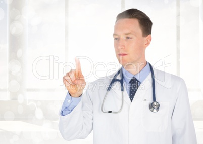 Doctor touching interface screen in clinic
