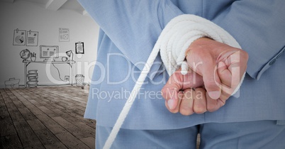 Businessman hands tied up with rope against graphic concept
