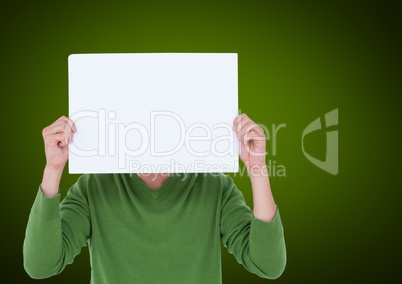 Man holding blank sheet of paper in front of his face