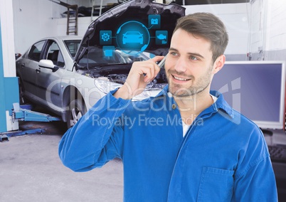 Mechanic talking on mobile phone with car mechanic interface