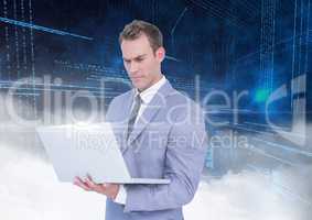 Businessman using laptop against digitally generated background