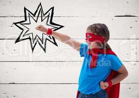 Superhero kid against wooden background