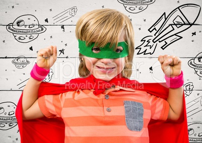 Kid in superhero costume flexing his arms against hand drawn space background