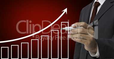 Businessman drawing upward trend graph with marker