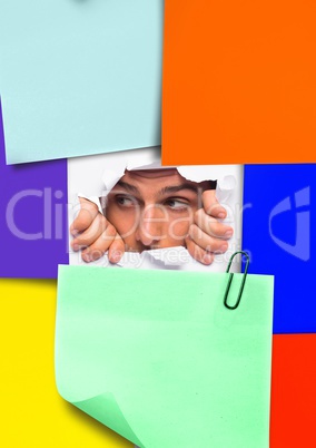 Man peeking through sticky notes