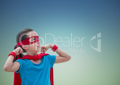 Girl in superhero costume showing fists against blue background