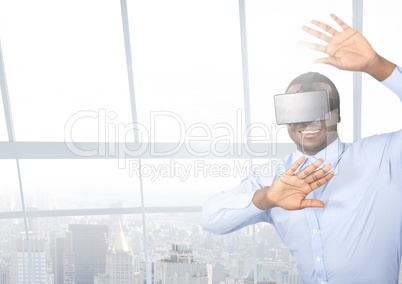 Businessman using virtual reality headset at office