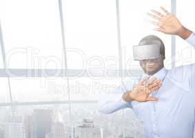 Businessman using virtual reality headset at office
