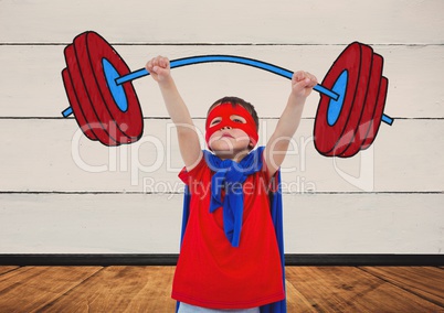 Boy wearing superhero costume lifting heavy weight