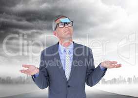 Confused businessman with sticky note stuck on his forehead against stormy sky in background