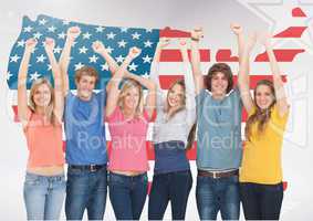 Friends celebrating against american flag in background