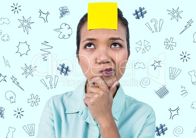 Thoughtful woman with sticky note on her forehead