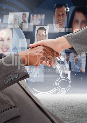 Business executives shaking hands against profile pictures in background
