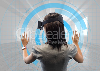 Female executive wearing virtual reality headset