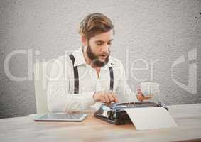 Businessman typing on typewriter at desk