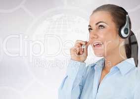 Businesswoman talking on headset against white background