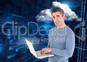 Smiling man using laptop against web binary code background