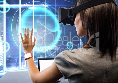 Woman using virtual reality headset against play icon in background