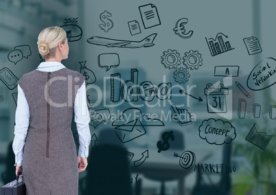 Businesswoman looking at business concepts