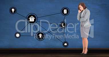 Businesswoman looking at connecting communication icons