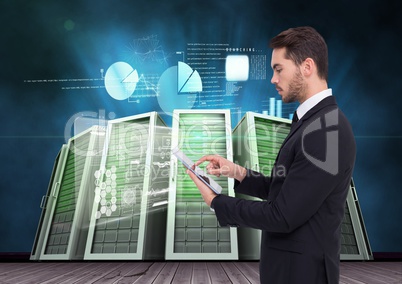 Businessman using digital tablet against server room and graph chart background