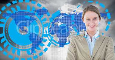 Businesswoman standing against digitally generated world map background