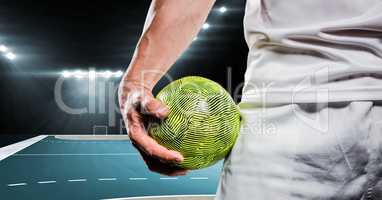 Close-up of handball player holding ball in his hand