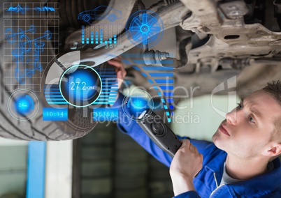 Attentive mechanic repairing hydraulic car