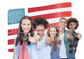 Portrait of smiling people showing thumbs up against usa flag