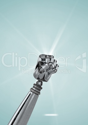 Robot fist against light blue background