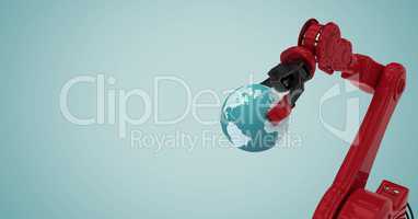 Red robot claw holding globe against light blue background