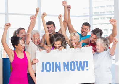 Group of cheerful people holding placard with text join now