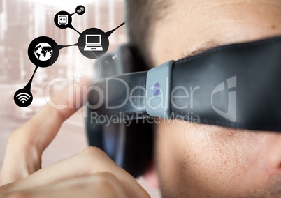 Close-up of man using virtual reality headset and network connection interface