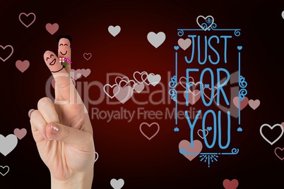 Smiling finger couple with valentines message against red background