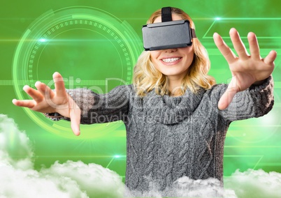 Woman using virtual reality headset against digitally generated background