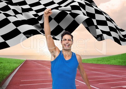 Athlete celebrating her victory with checkered flag on race track