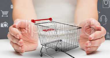 Woman hands cupped around shopping cart