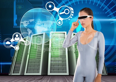 Woman using virtual reality glasses against server systems in background