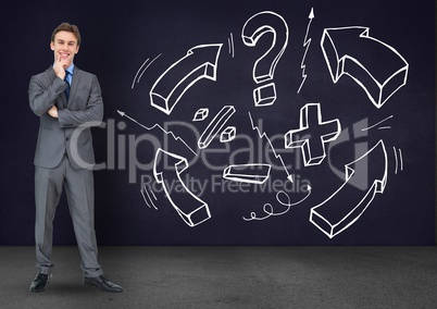Smiling businessman standing next to mathematics icons