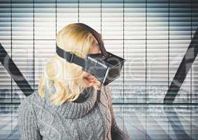 Smiling woman using virtual really headset