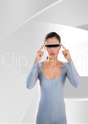 Digital composite image of woman using virtual reality glasses