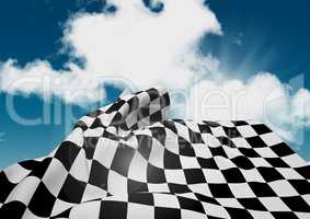 Checkered flag waving against cloudy sky