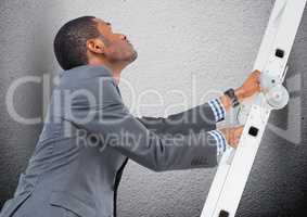 Businessman climbing a ladder against grey background