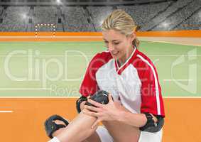 Female handball player wearing kneepad