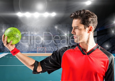 Man holding handball at handball court
